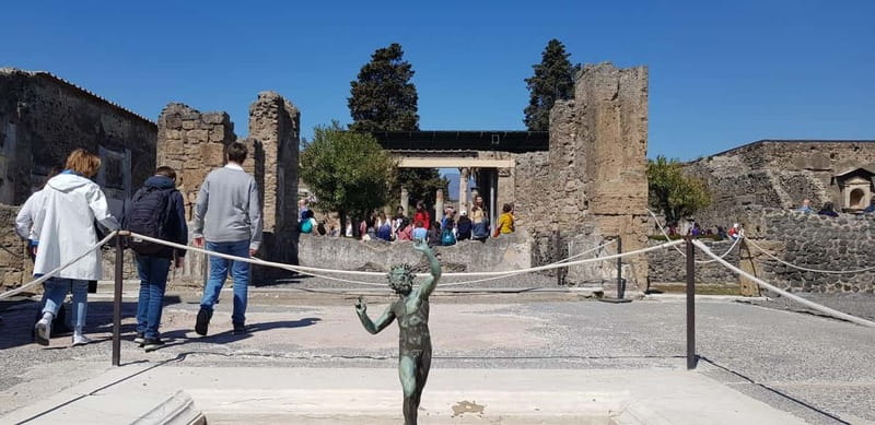 Pompeii: Entry Ticket w/ Guide and Transfers or Audio Guide - Daily life details: baths, bakeries, and shops