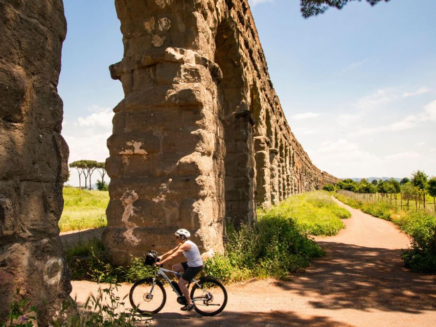 Rome: Appian Way, Catacombs & Roman Aqueducts Top EBike Tour - Parco degli Acquedotti: why the aqueduct arches are the star