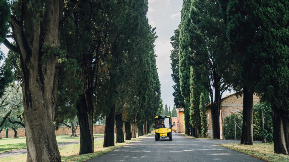 Rome: Appian Way Golf Cart Tour with Roman Catacombs Entry - Aurelian Walls and Pyramid of Cestius: finishing with Rome’s boundary lines