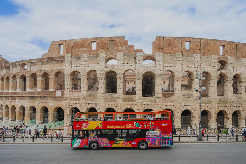Rome: City Sightseeing Hop-on Hop-off Bus with Audioguide - Colosseum stop: plan for photos, and stay flexible