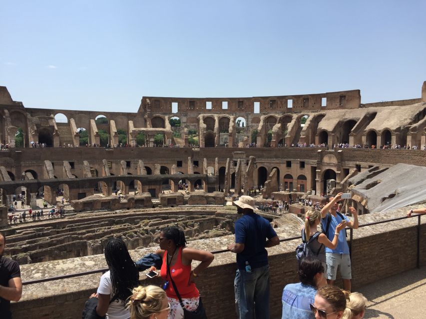 Rome: Colosseum Arena Guided Tour with Roman Forum Option - Porta Libitinaria and the Colosseum’s engineering story