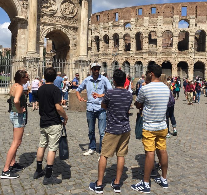 Rome: Colosseum Arena Guided Tour with Roman Forum Option - Entering the Colosseum: meeting point and what to expect