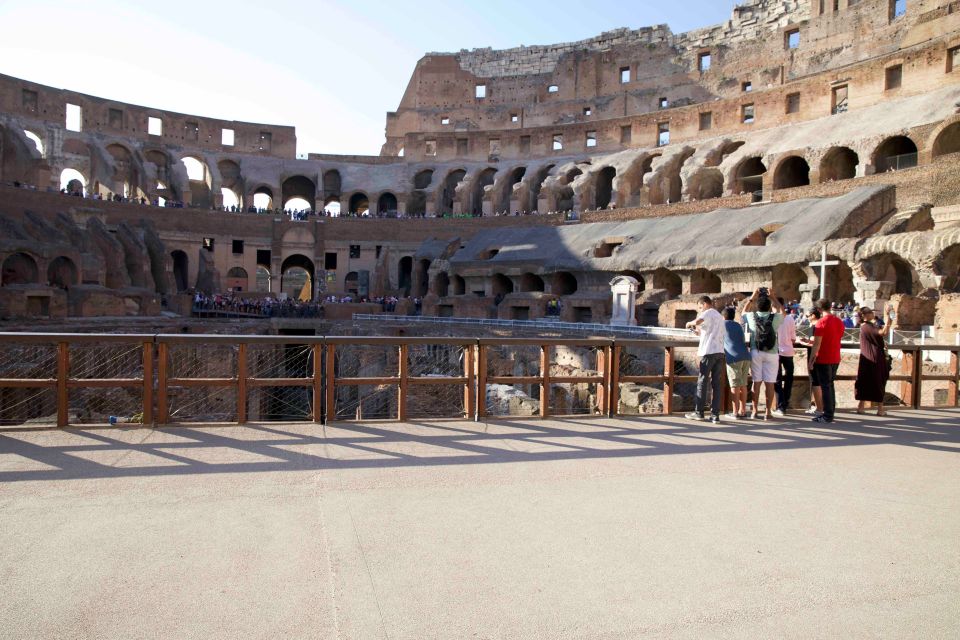 Rome: Colosseum Arena Private Tour with Ancient City - Entering Through the Gate of Death and Stepping Onto the Floor