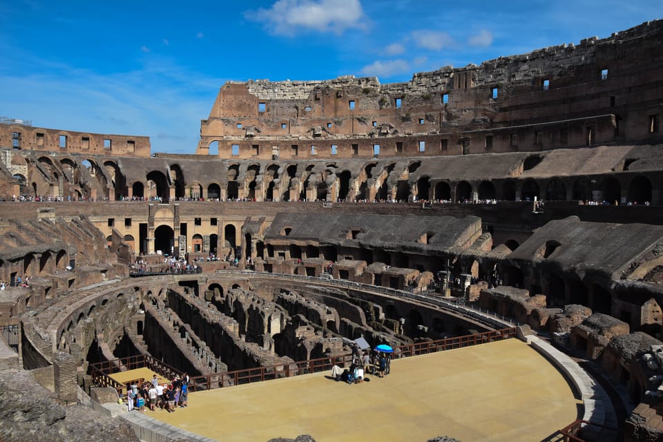 Rome: Colosseum Experience with Audio Guide and Arena Option - Hosted Entry at the Meeting Point: Find Crown Tours Fast