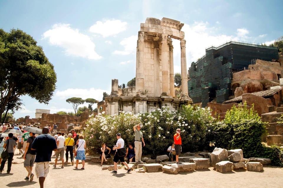 Rome: Colosseum, Forum, Palatine Hill Entry & Audioguide App - Entering the Colosseum: strict time slots and airport-style security