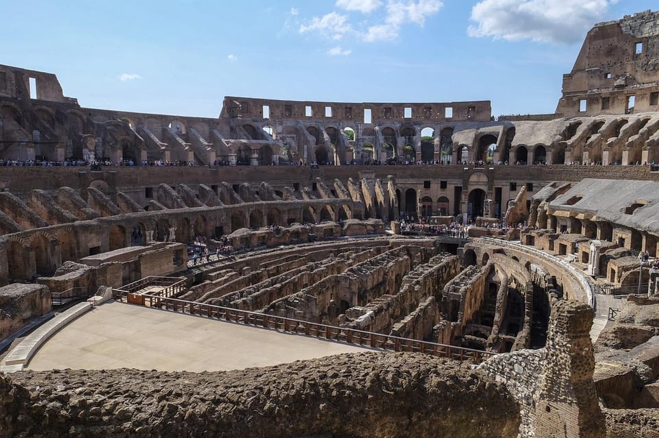 Rome: Colosseum, Forum, & Palatine Hill with Audio Guide - Walking the Roman Forum: government buildings and daily life in ruins