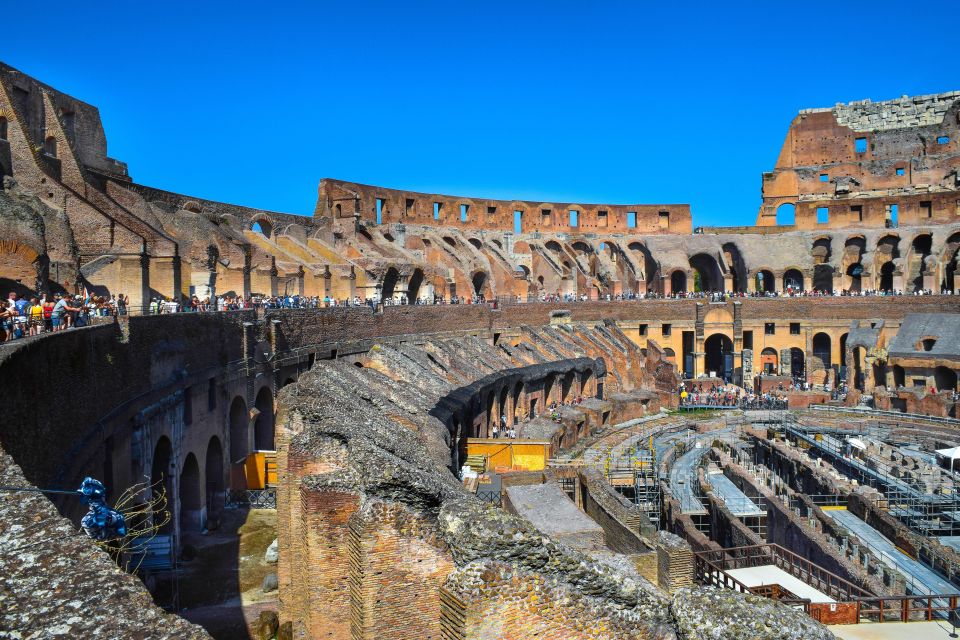 Rome: Colosseum, Roman Forum, and Palatine Hill Ancient Tour - Arches of Titus and Constantine: Small Stops With Big Meaning